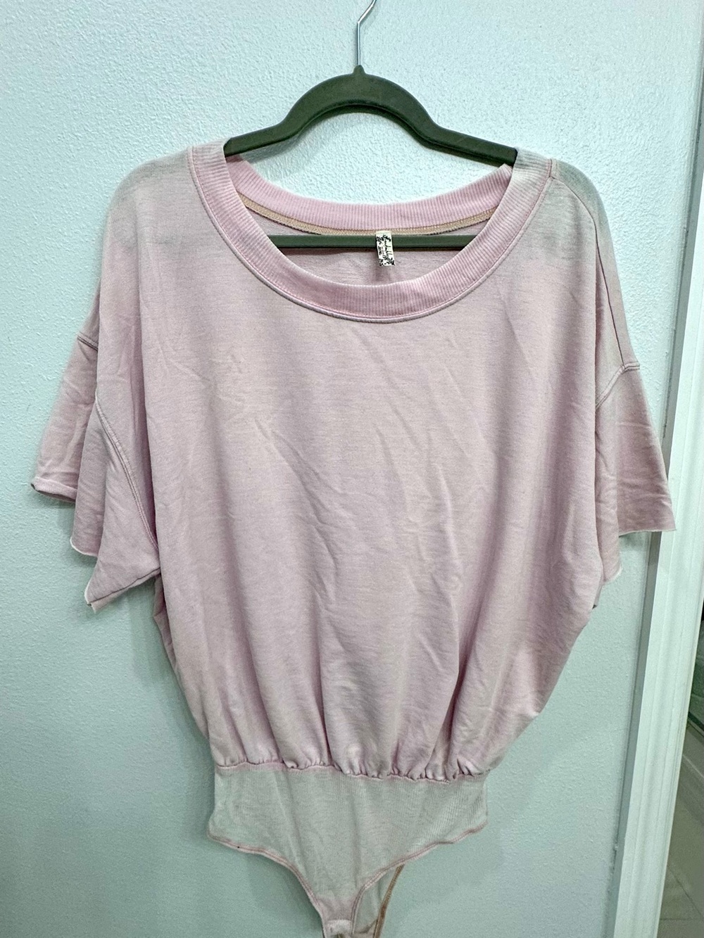 Free People Pale Pink Short Sleeve Bodysuit